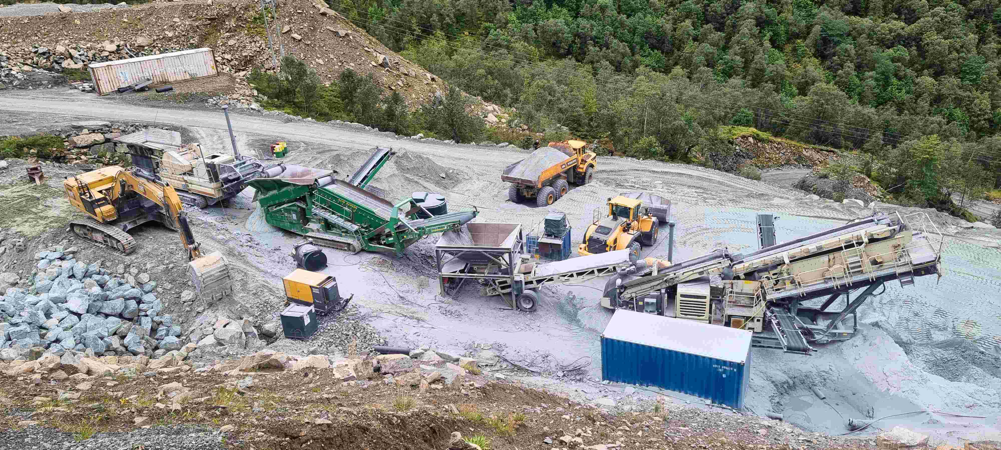 Maskiner som knuser olivin